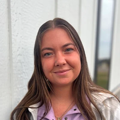 Team Member Raquel Smiling Outdoors