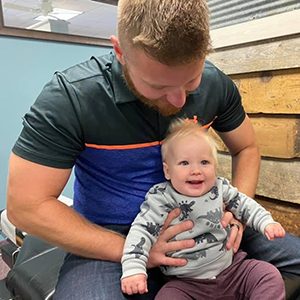 Chiropractor Albertville MN Marcus Kasper with Baby